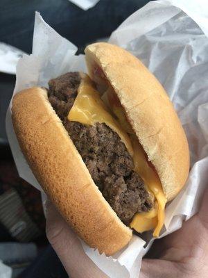 Single cheese burger with everything