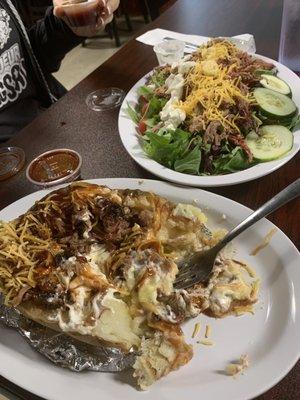 Loaded potato with brisket, and the salad with brisket on top. Both super delicious.