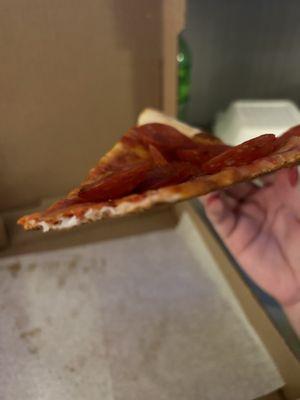 Thinnest pizza I've ever seen.