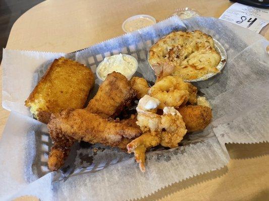 2 piece shrimp and cod with macaroni and cornbread.