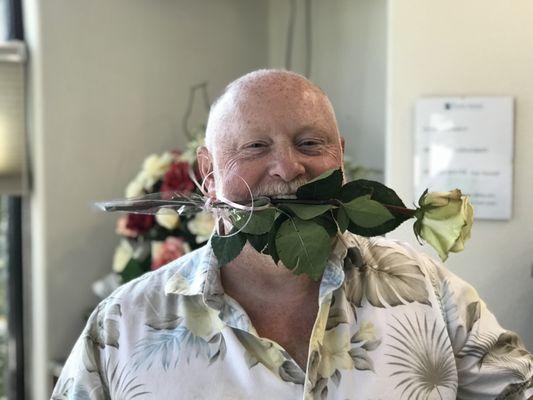 David is a long-time patient who obviously enjoys receiving a rose at the end of his hygiene visit.