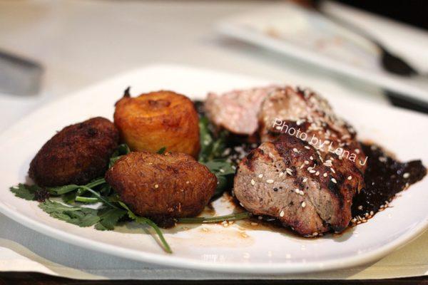 Oaxacan Pork Tenderloin ($27) - classic mole, twice cooked plantain, sesame