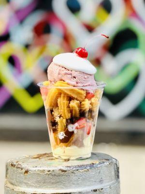 cherry parfait | churro bites, lemon custard, nutella, dark cherry ice cream, strawberry, marshmallow spread, cherry (april special)