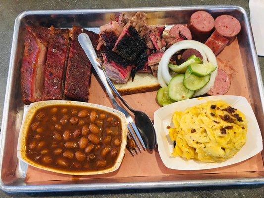 Pork ribs, burnt ends and sausage with baked beans and Mac n cheese.