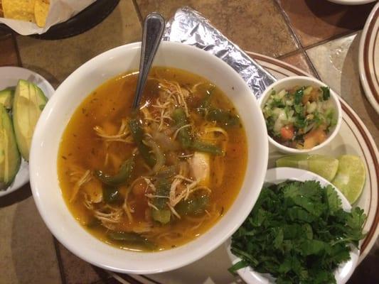 Caldo de Pollo - Chicken Soup. I had then add the cilantro, and bought a side of sliced avocados!!