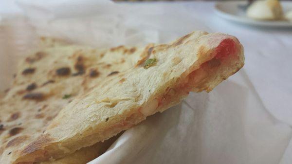 Cherry & pistachio filling in Kashmiri Naan.