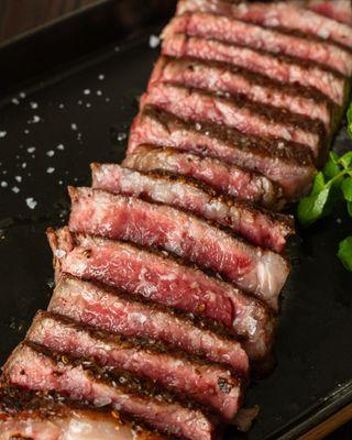 Unlimited Ribeye -
Endless servings of mouthwatering ribeye steak, fries and salad. All just for $45