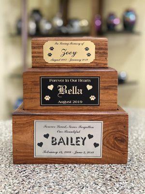 We offer engraved name plates with remembrance quotes for your furry friends urn. Pictured with our popular, Tree of Life, wooden boxed urn.