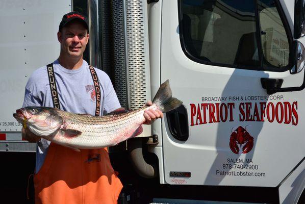 Chris and a big Stripe Bass