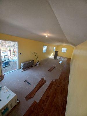 We installed drywall on the ceiling and walls. We also gave it a " knock down" texture.  Also painted the walls.