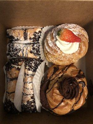 Minis and regular size cannolis, chocolate and strawberry shortcake zeppole