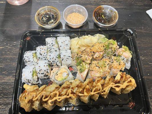 Sad Boy roll, Volcano Jalapeño and a Philly roll - all were really good - the torched lemon and sesame seeds were perfect on the Sad Boy!