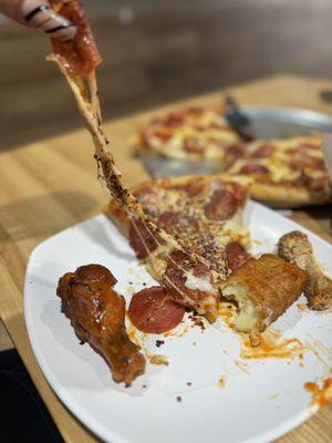 Pepperoni pizza wings and Mozzarella Sticks