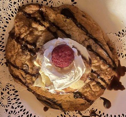 Chocolate Chip Cookie topped with Vanilla Ice Cream and a Raspberry. very tasty but the cookie was very hard.