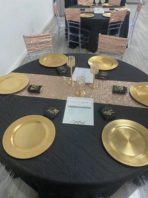 Guest table with party favors, menu and agenda for evening