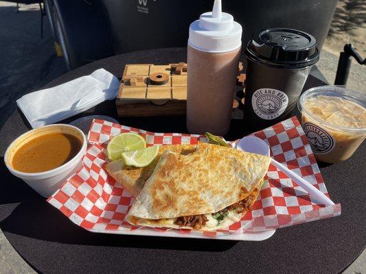 A large macchiato, and a small, peppermint, iced coffee. Along with the quesadilla birria from the neighboring truck.