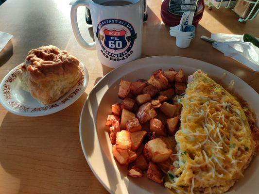 House omelette, potato, and a biscuit.