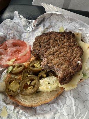 Disgusting Jalapeno Pepper Jack Cheeseburger. Cold meat and cold cheese. The lettuce and jalapeños are old soggy and wilted.