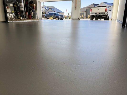 Hellfire garage floor coating with a shimmery silver matte finish.