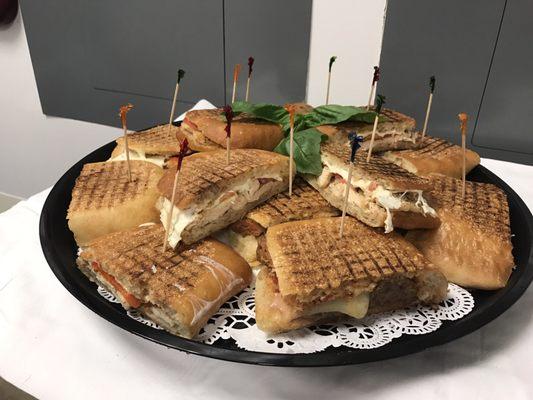 Small tray for $45- 5 paninis cut up in tray (3 pieces each)