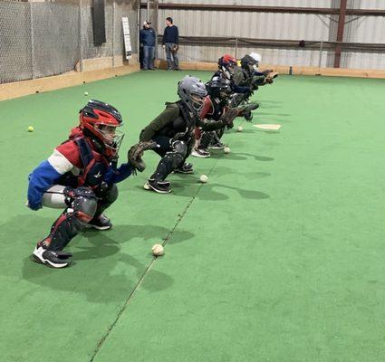 6 week catching camp this past winter.  Baseball catchers.