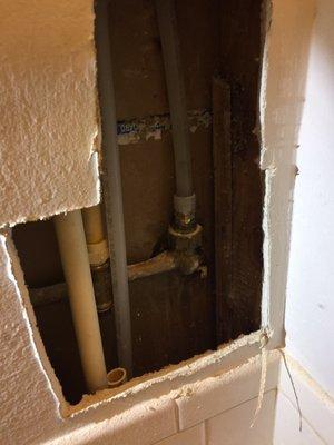 Excessive holes in wall to make it easier for Plumber