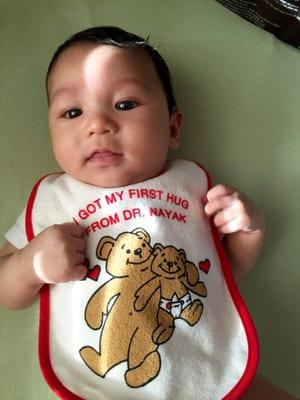 Dr. Nayak delivered our healthy baby boy. He loves his new bib from Dr. Nayak!