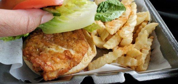 Fried chicken sandwich with double fries - under the bun