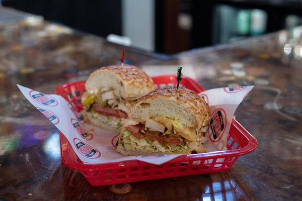 The Sandwich Spot's signature OMG Sandwich combines savory marinated chicken, teriyaki, pineapple, melted jack cheese for a delicious taste.