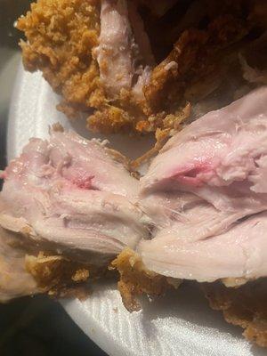 Undercooked pink chicken