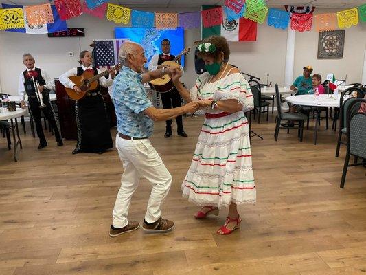 Our lovely couple celebrating Independence Day with lively music and dance.