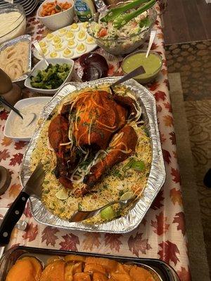 Thanksgiving tandoori turkey with vegetable biryani, a side of chutney, salad, mashed Potatoes and gravy! So delicious!!!!!