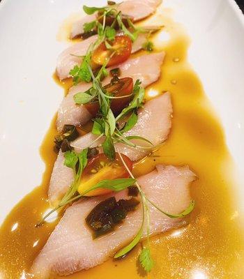 Yellowtail with jalapeños in a spicy ponzu sauce