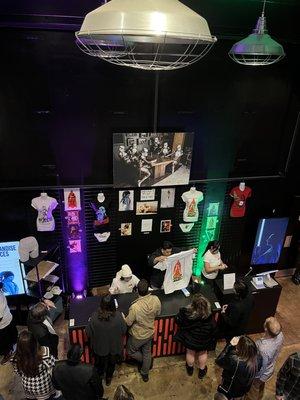 View of the merch area from upstairs