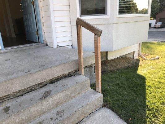 Sunken and uneven steps with handrail that is not stable