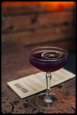 Mood Indigo: house rum blend, pineapple puree, lime, and naturally tinted with butterfly pea flower