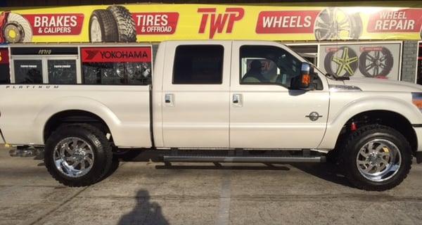 2016 FORD F250 WITH 20X12 AMERICAN FORCE WHEEL POLISH 
 TIRE AND WHEEL PRO FOR YOU TRUCK LIFT AND ALIGNMENT