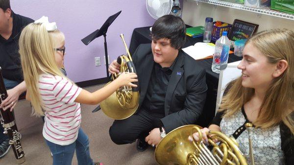 Hands on instrument exploration in our Level 5 classes inspires our young musicians!