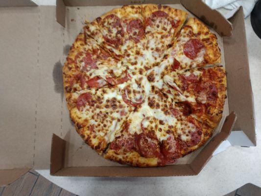 Double cheese double pepperoni pizza. Beautiful presentation isn't it