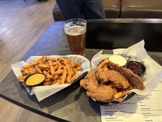 Expensive cheese fries and chicken fingers. Foamy under filled beers.