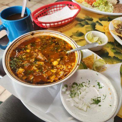 Menudo, served with homemade flour or corn tortillas. So good. Very authentic