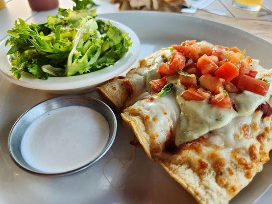 Roasted Lime Chicken Burrito with side of yummy cilantro cream sauce