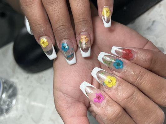 Full set. French with natural flowers.