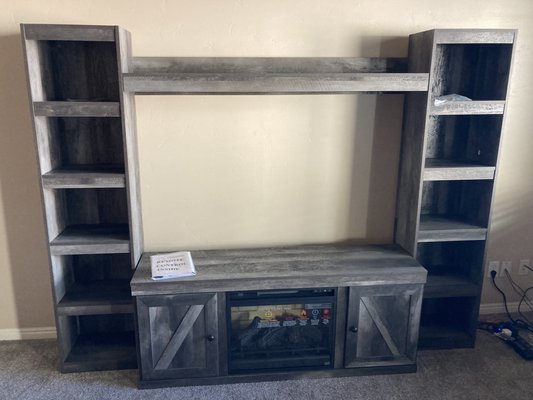 Finished Ashley home entertainment center.