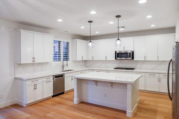 New cabinets, countertops and flooring