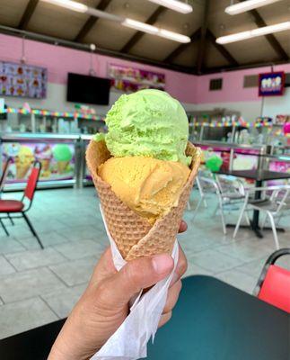 Pistachio and Banana ice cream in waffle cone