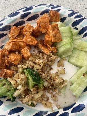 Buffalo chicken with riced cauliflower- I pan fryed the cauliflower to make it taste better and added cucumbers