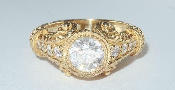 Art Deco Style 18Karat Yellow Gold Diamond Ring 1.50 carat total weight