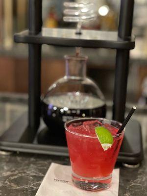 Spicy hibiscus margarita hand crafted and can be served to go.