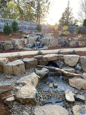 Water Feature is a 25' pondless waterfall